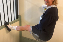 woman, smiling, showing wild socks